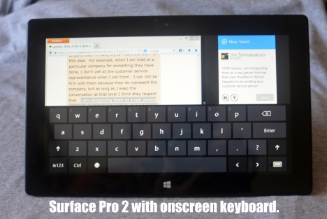 Surface Pro 2 with the on-screen keyboard over the LMS and Twitter.